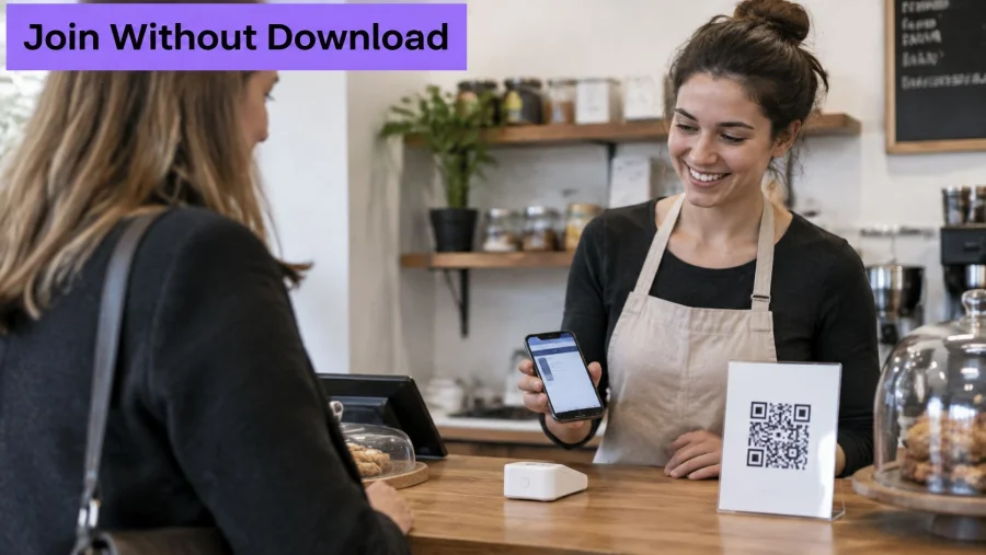 A friendly barista showing a mobile phone to a customer at a cafe counter with a QR code.