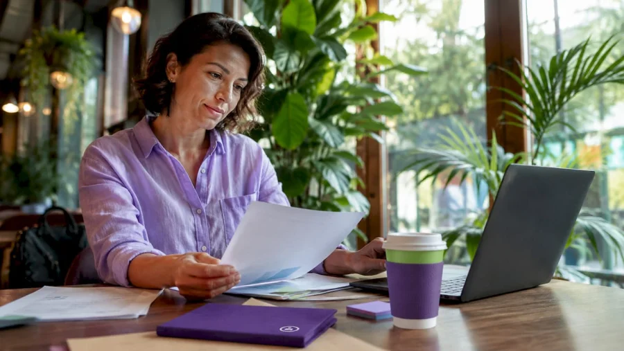 Small business owner reviewing marketing automation reports